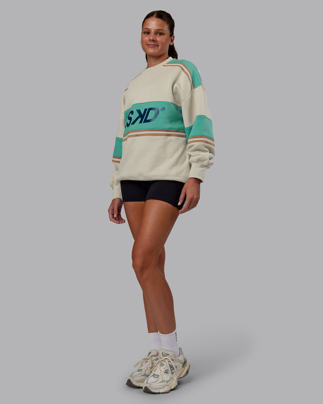 Woman wearing A-Team Sweater Oversize - Shale Beige-Agate Green | Model:Phoebe | Size:XS