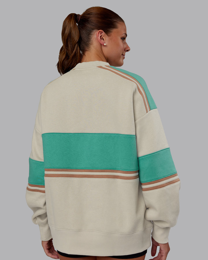 Woman wearing A-Team Sweater Oversize - Shale Beige-Agate Green | Model:Phoebe | Size:XS
