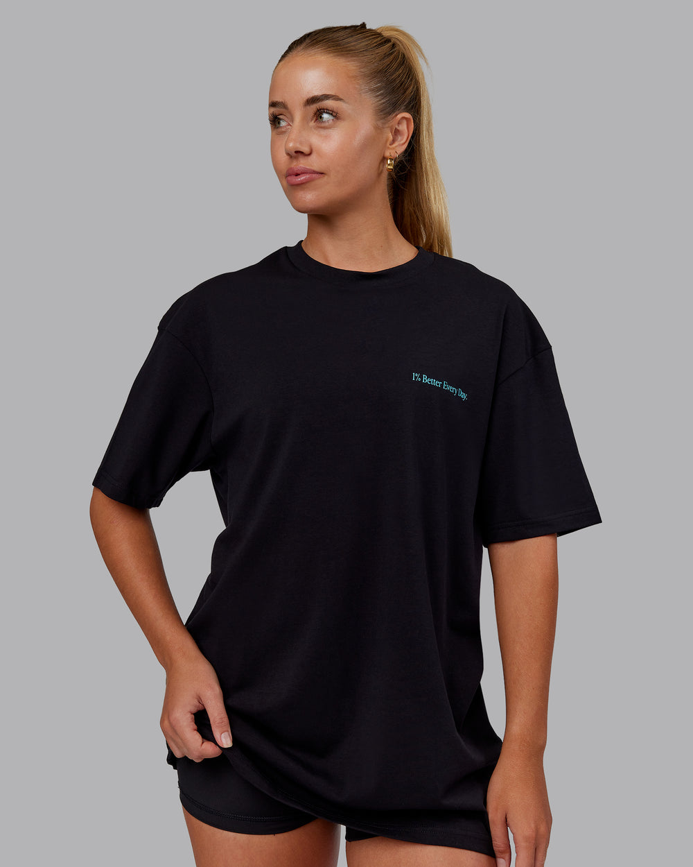 Woman wearing Better Every Day FLXCotton Tee Oversize in Black-Blue Atoll | Size:XS | Model:Hannah