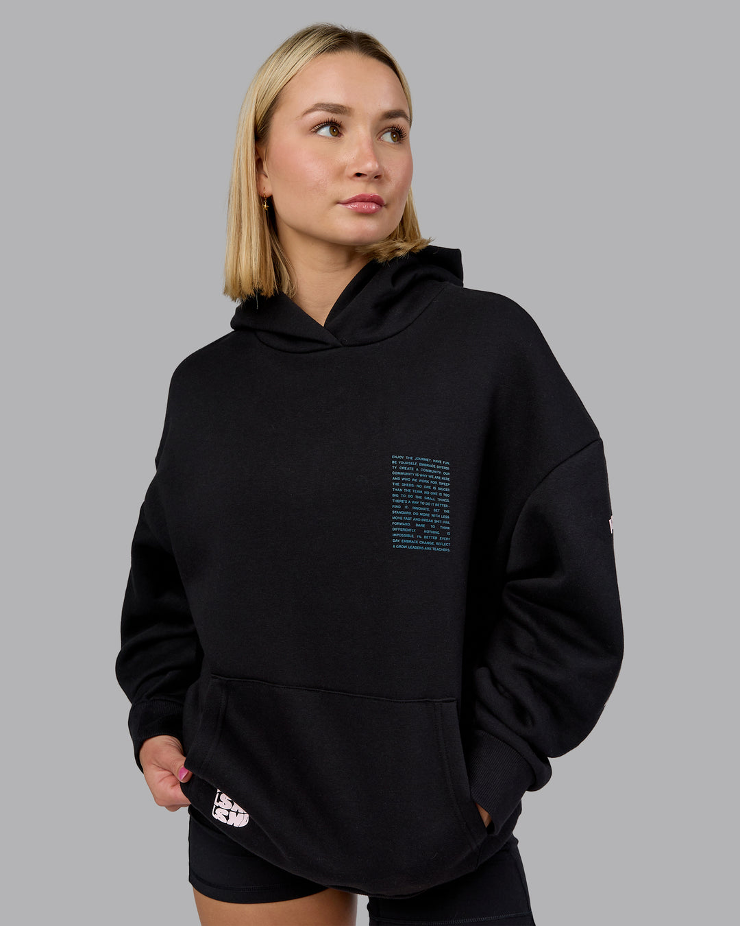 Woman wearing Displacement Oversized Hoodie - Black-Blue Coral | Model:Halle | Size:XS