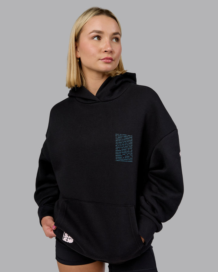 Woman wearing Displacement Oversized Hoodie - Black-Blue Coral | Model:Halle | Size:XS
