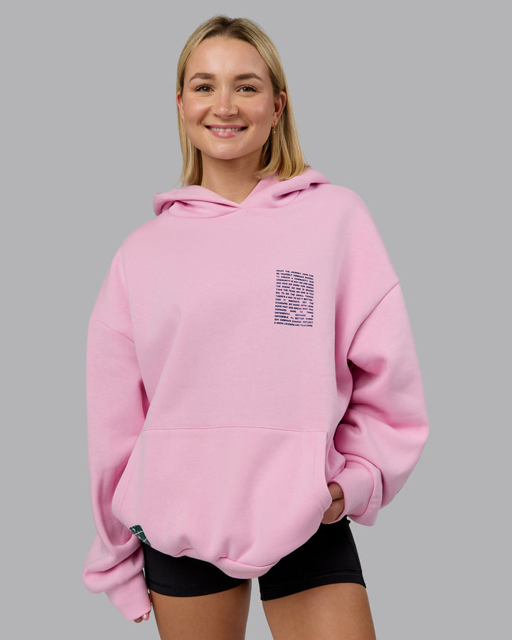 Woman wearing Displacement Oversized Hoodie - Light Bubblegum-Dark Moss | Model:Halle | Size:XS
