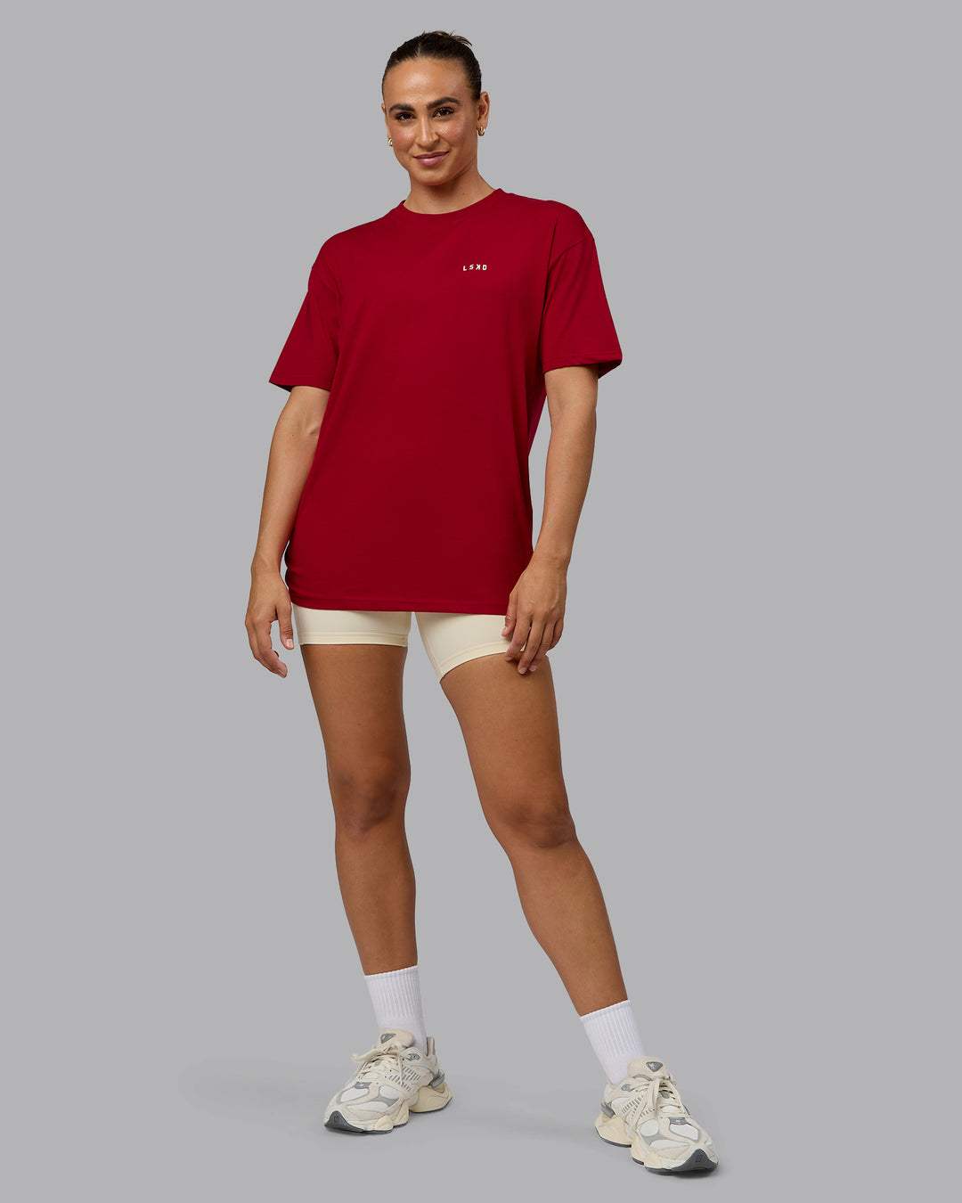 Woman wearing Unisex Enjoy the Journey Value Series FLXCotton Tee Oversize - Cherry Red-Ivory