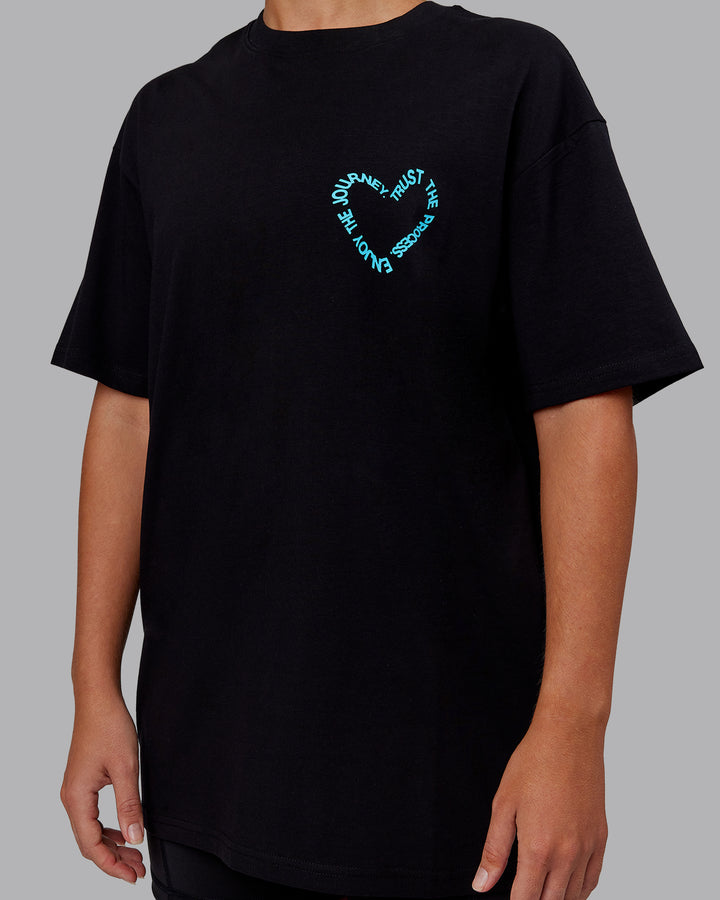 Woman wearing Love The Process FLXCotton Oversize Tee - Black-Blue Atoll | Model:Hannah | Size:XS
