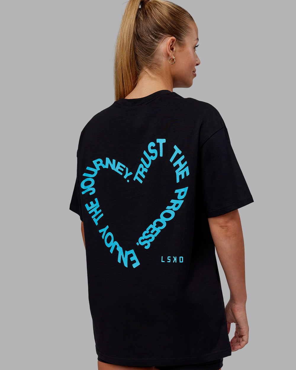 Woman wearing Love The Process FLXCotton Oversize Tee - Black-Blue Atoll | Model:Hannah | Size:XS