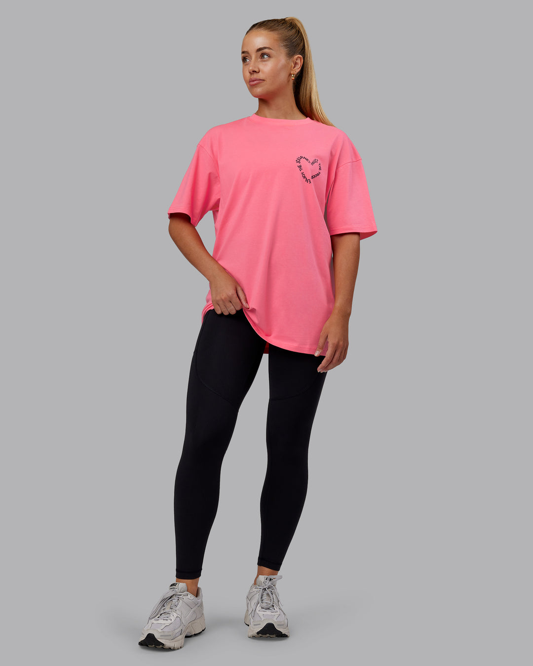 Man wearing Love The Process FLXCotton Oversize Tee - Pink Lemonade-Cherry Lacquer | Model:Hannah | Size:XS