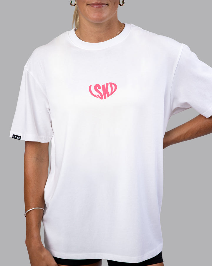 Woman wearing Unisex Love To Train FLXCotton Tee Oversize - White-Pink Lemonade | Size:XS
