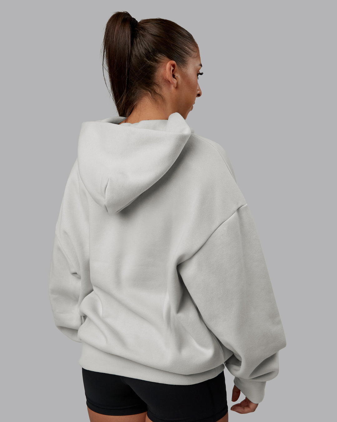 Woman wearing MVP Oversized Hoodie - Digital Mist | Model:Tylah | Size:XS