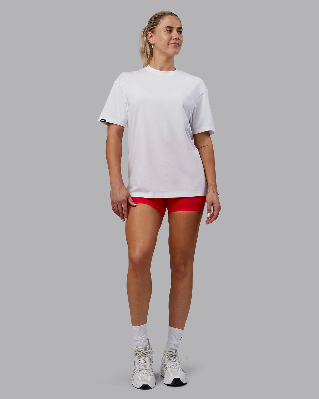 Woman wearing Peaches Pilates x LSKD FLXCotton Tee Oversize - White