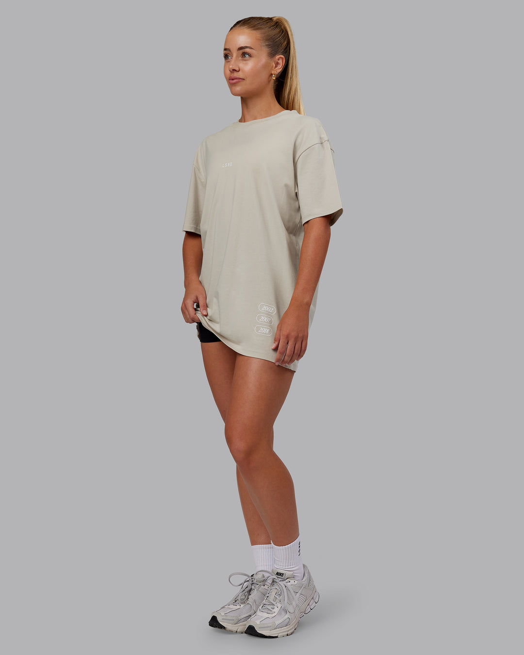 Woman wearing Timeline FLXCotton Oversized Tee - Shale Beige-White | Model:Hannah | Size:XS