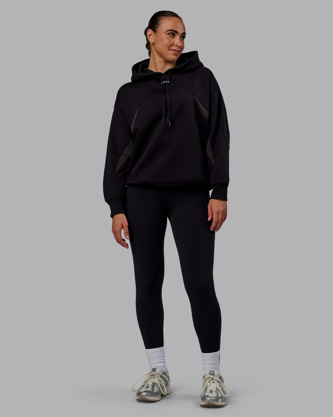 Woman wearing Unisex Y2K Concept Panel Hoodie - Black-Pirate Black