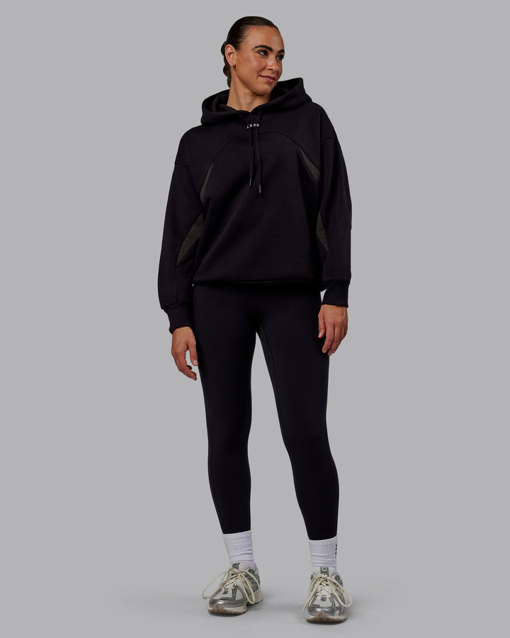 Woman wearing Unisex Y2K Concept Panel Hoodie - Black-Pirate Black
