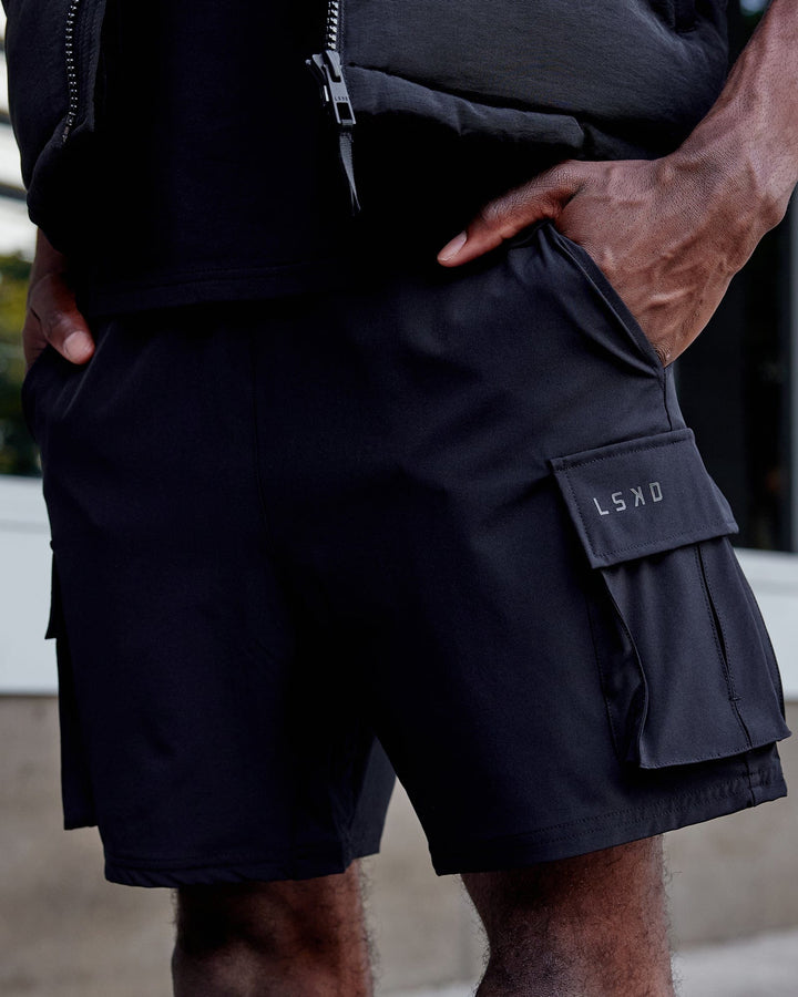 Man wearing Energy Stretch Performance Cargo Short - Black
