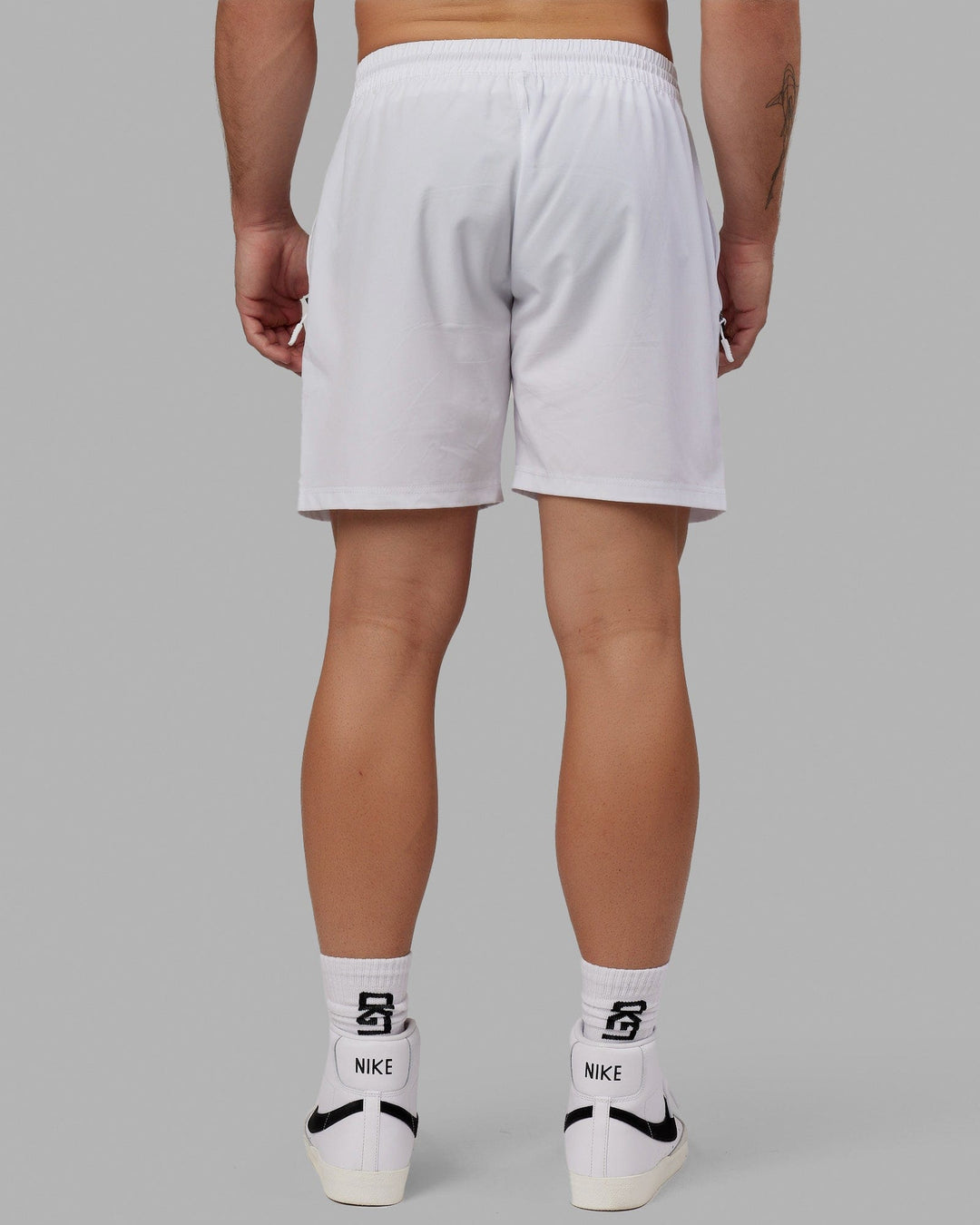 Man wearing Rep 7&quot; Performance Short - White