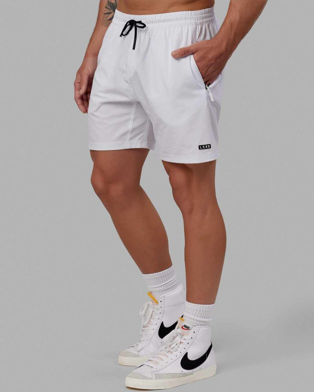 Man wearing Rep 7&quot; Performance Short - White