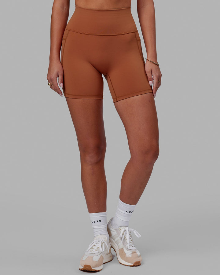 Woman wearing Fusion Mid Short Tight - Hazel
