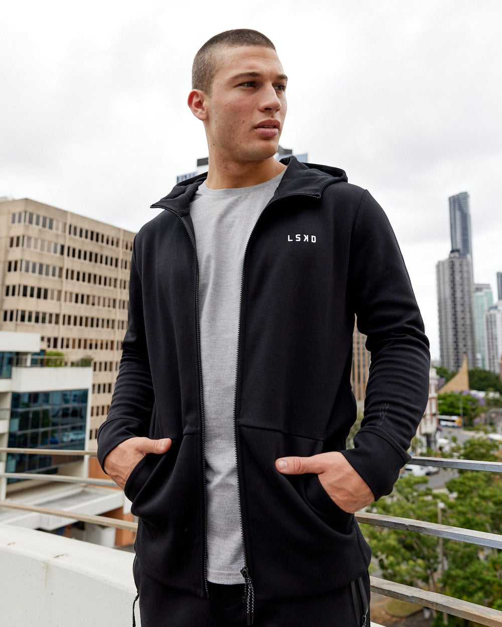 Man wearing Mens Athlete ForgedFleece Zip Up Hoodie - Black