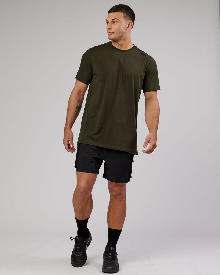 Man wearing Energy Stretch Performance Cargo Short - Black
